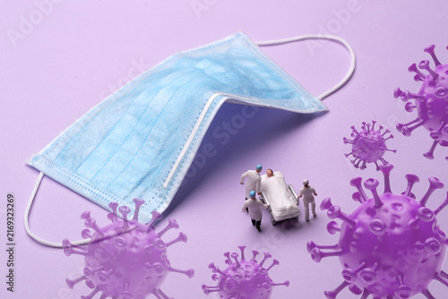 Paramedics Treating Patients with Virus Protection Medical Concept
