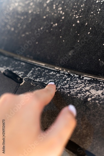 Dust and Dirt on Black Car Surface