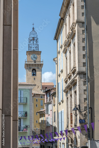 Saint-Jerome Cathedral belltower looms out of historical buildings, Digne, France