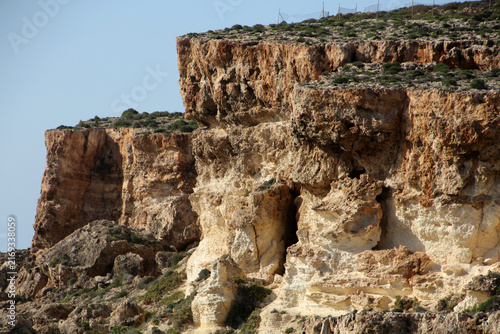 Sandstone coast on the shores of Anchor Bay, Malta
