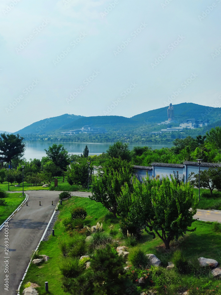 Fototapeta premium Nishan Sacred Land With Green Mountains Lake Park And Natural Landscape