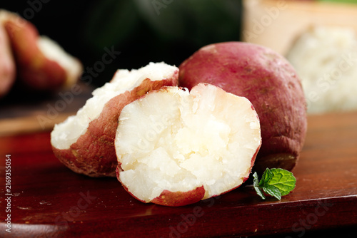 Принти на полотні Heart-shaped Shaanxi sweet potatoes with white flesh on wooden board