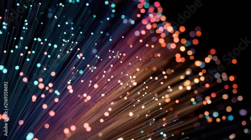 Fiber optic cables glowing, technology, Glowing fiber optic cables illuminated in a dark setting
