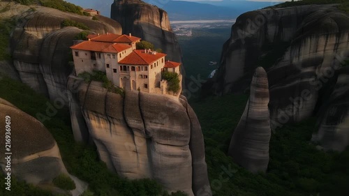 Monastery perched atop a dramatic rock formation in Meteora, Greece.