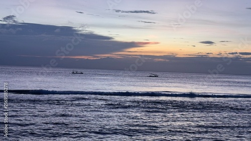 Konstfotografi Fishing boats on calm ocean during sunset