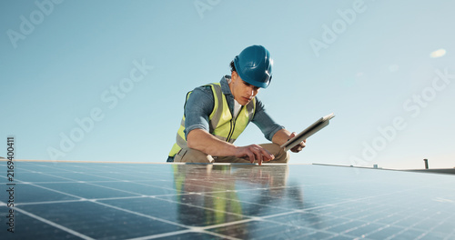 Canvastavla Man, electrician and solar panels outdoor with tablet, research and inspection for fault detection