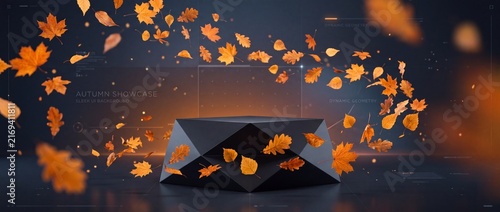 Polygonal black podium floats within swirling orange autumn leaves on dark blue background creating modern product showcase template