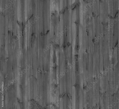 Принти на полотні Dark monochromatic texture featuring vertically aligned weathered wooden planks in deep charcoal and gray tones