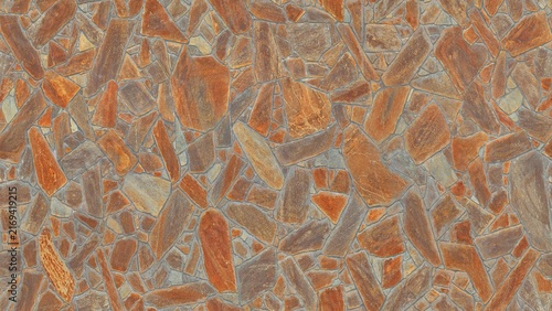 фотографія A highly textured irregular flagstone surface featuring a mosaic pattern of flat, jagged stones in various shapes and sizes