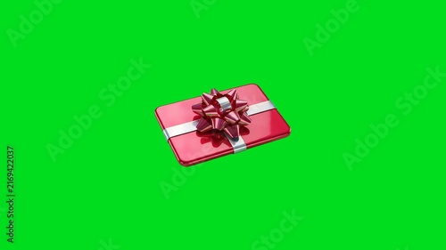 A shiny red rectangular gift box wrapped with a metallic ribbon and bow