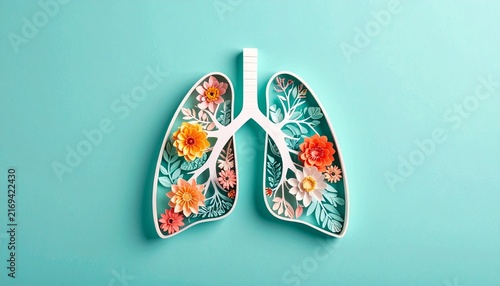 Artistic paper craft depiction of human lungs filled with colorful blooming flowers and leaves on a soft light blue background for health.