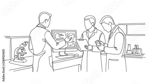 Three scientists working together in a laboratory setting.