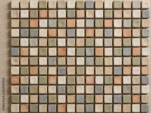 Multicolor mosaic tile pattern background with square stone blocks for interior design.