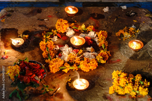 India. State of Uttar Pradesh. Varanasi. Ritual offerings consisting of small oil lamps (diyas) and flowers