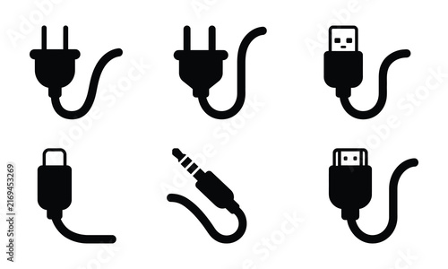 Collection of electronic connectors and cables in silhouette against a clean white backdrop