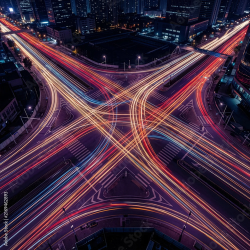 Busy night city intersection long exposure light trails. Modern traffic motion, vehicle lights, highway crossroad. AI generated