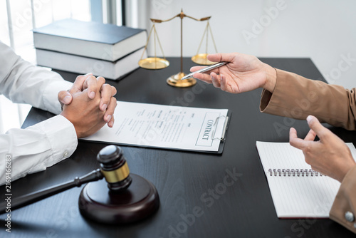 Картината върху платно Businesswoman and Male lawyer consult and conference having team