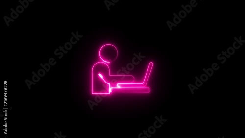 The blinking neon light of stick figure using smartphone in restroom icon in the black background.