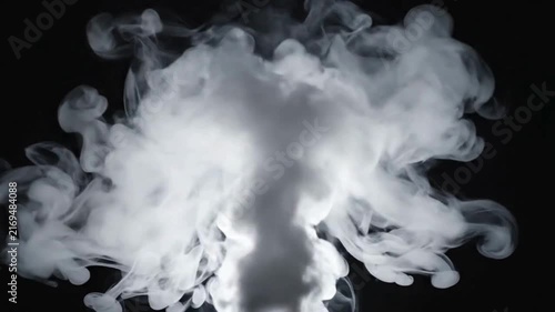 White smoke in a dark room