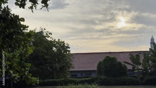 magic hour in the city, the sun ready to set and bird flying around in the sky, morning nature sound