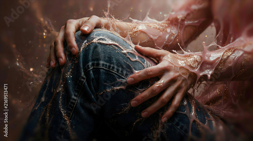 Mysterious portrait of hands draped in spooky cobwebs and dust particles, symbolizing decay or entrapment