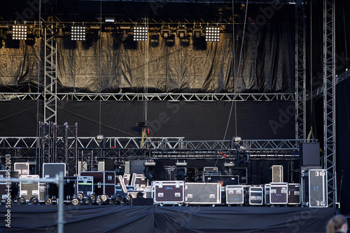 Картината върху платно Concert stage setup empty lighting rig truss flight cases