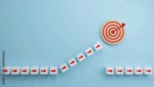 Red arrows on cubes ascend towards a bullseye symbolizing business growth and achievement