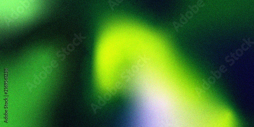 Abstract green and yellow light gradient with grainy texture