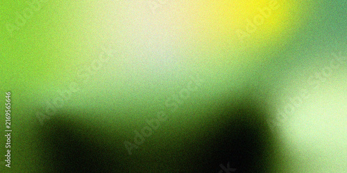 Abstract blurred background with a soft gradient of green and yellow tones