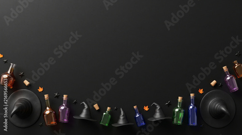Halloween flat lay with witch hats and potion bottles on black background