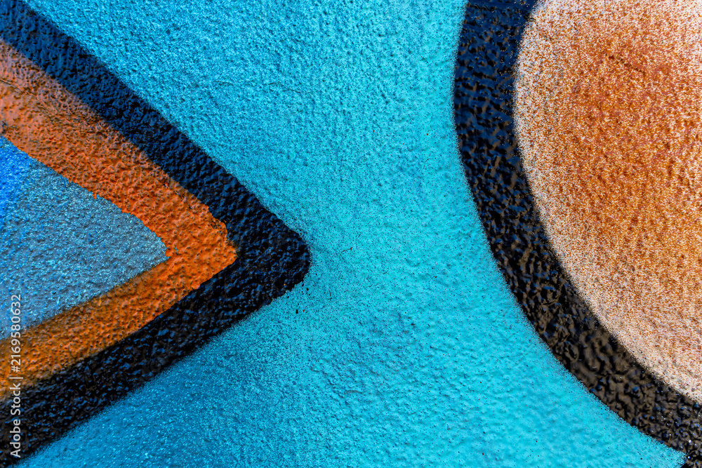 Fototapeta premium Art under ground. Beautiful street art graffiti background. The wall is decorated with abstract drawings house paint. Modern style urban culture of street youth. Abstract picture on wall