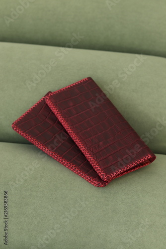 Red crocodile leather wallet with decorative stitching and minimalist handmade design. Elegant compact wallet with textured finish, premium craftsmanship and stylish everyday functionality.