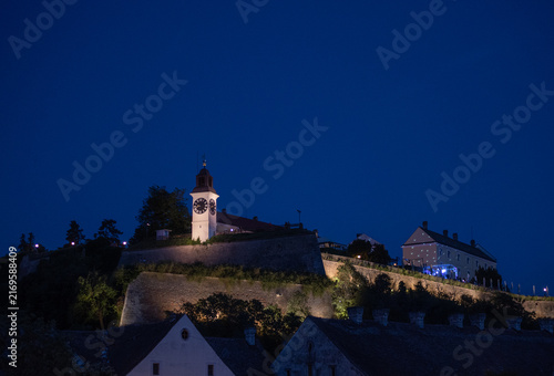 Canvastavla Illuminated Petrovaradin Fortress clock tower stands atop stone defensive walls