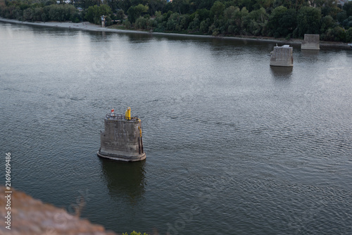 Canvastavla Concrete bridge pillars stand isolated in wide Danube river