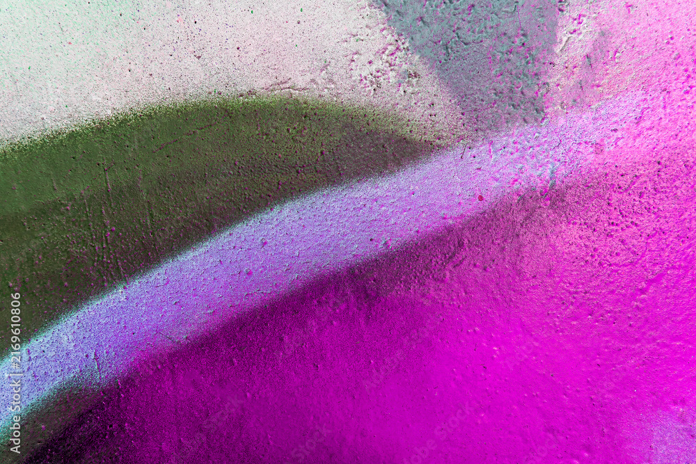 Fototapeta premium Beautiful bright colorful street art graffiti background. Abstract creative spray drawing fashion colors on the walls of the city. Urban Culture gradient texture, copyspace backdrop