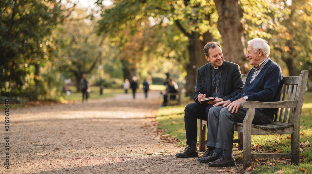 Fototapeta premium Clergyman and elderly man talking on park bench in autumn