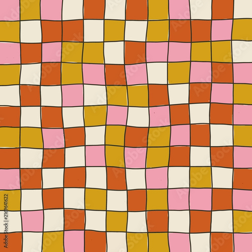 Vibrant checkerboard pattern featuring hand drawn retro colorful squares in a seamless grid with pink, orange, and mustard yellow tones.