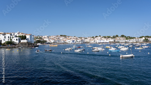 Boats Moored in Cadaques Harbor. Traditional boats moored in the calm harbor of Cadaques on the Costa Brava in Catalonia, Spain
