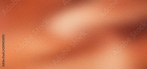 Foto Terracotta abstract background with grainy texture and soft gradients, warm copper blurred backdrop for cosmetic branding, earthy clay colored wallpaper with organic light and shadow effects