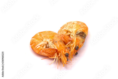 The boiled shrimp has an orange color against a white background.