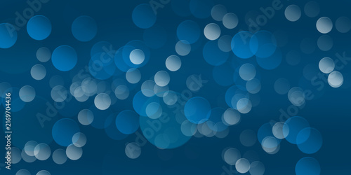 Foto Abstract blue bokeh background, with soft glowing, circles of light, in various
