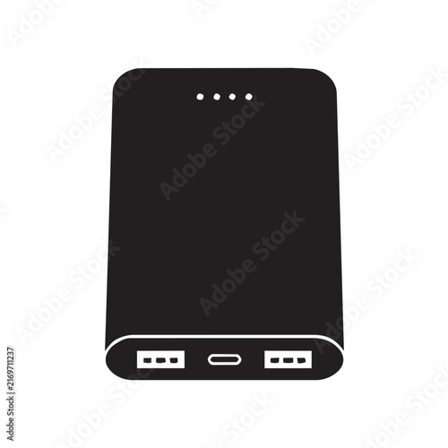 Black portable power bank with USB ports and charging indicator isolated on clean white background