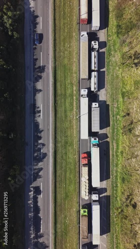 Aerial Top View of Heavy Traffic Jam with Trucks Line on Highway