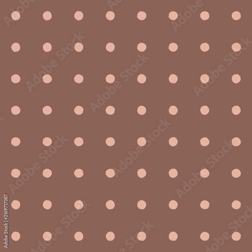 Subtle polka dot pattern with a warm brown and beige color palette