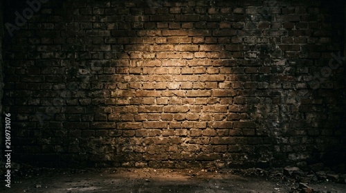 Dark Grunge Brick Wall with Spotlight, Textured Background