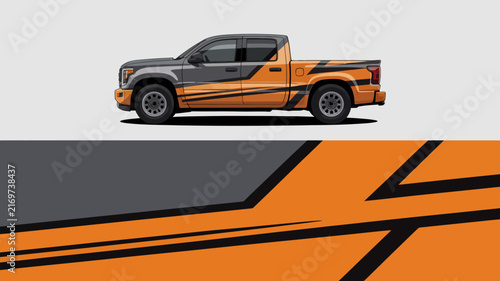 Customized pickup truck with vibrant orange and black racing stripe design.