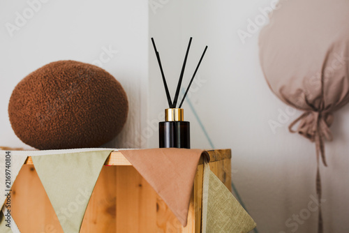 фотографія A diffuser is a means to eliminate unpleasant odors in the living room or office