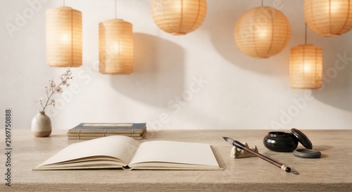 Traditional calligraphy brush and open book on wood desk