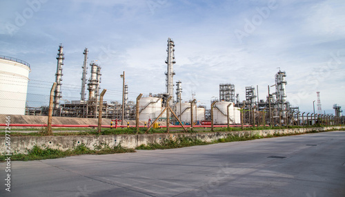 Oil and Gas Industrial zone,The equipment of oil refining,Close-up of industrial pipelines of an oil-refinery plant,Detail of oil pipeline with valves in large oil refinery.