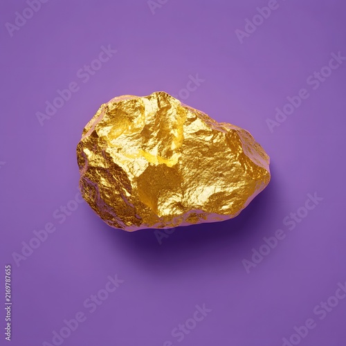 A gleaming gold nugget rests against a smooth, contrasting purple surface. Metallic treasure is visible.